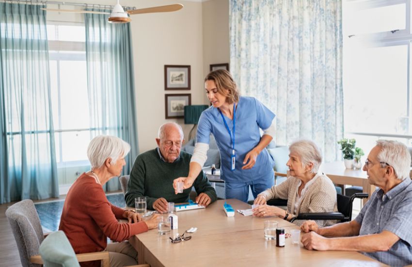 Nurse helping disable community