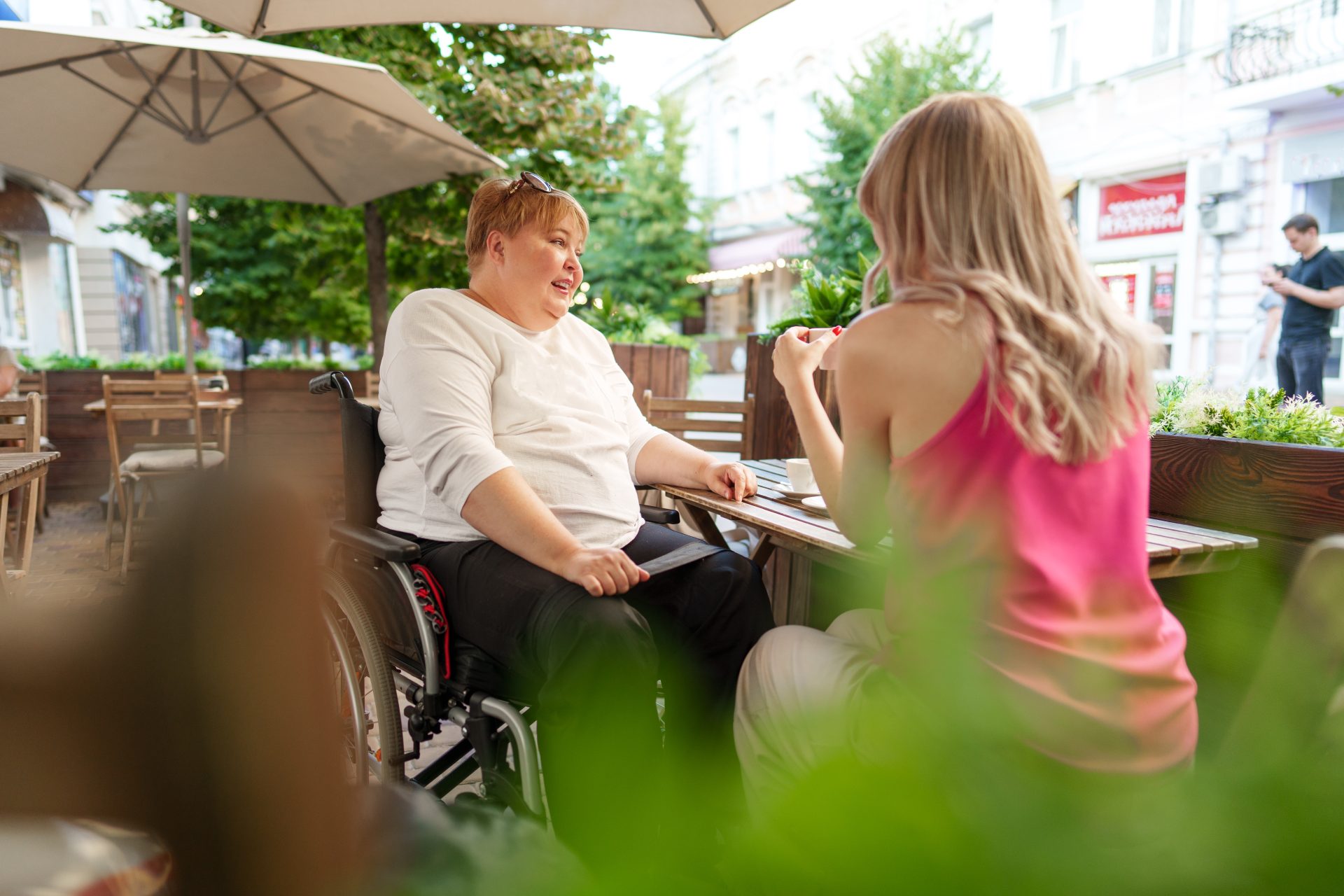 mother with disability in wheelchair talking to he 2023 11 27 05 13 35 utc scaled